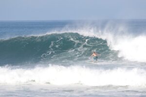 Edward surfing in Nosara, Costa Rica